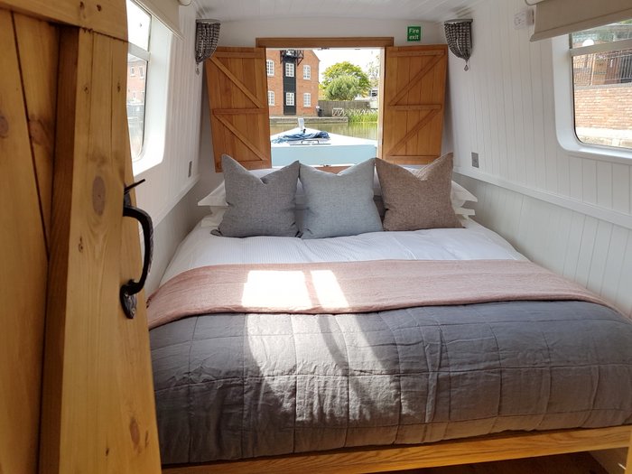 Boutique narrowboat Chalkhill Blue bedroom king size bed holiday boat