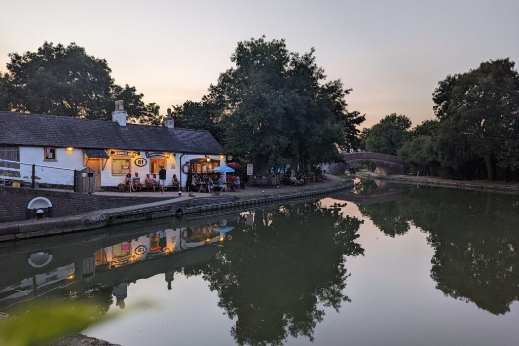 Luxury narrowboat holiday moored near a quiet canal‑side pub